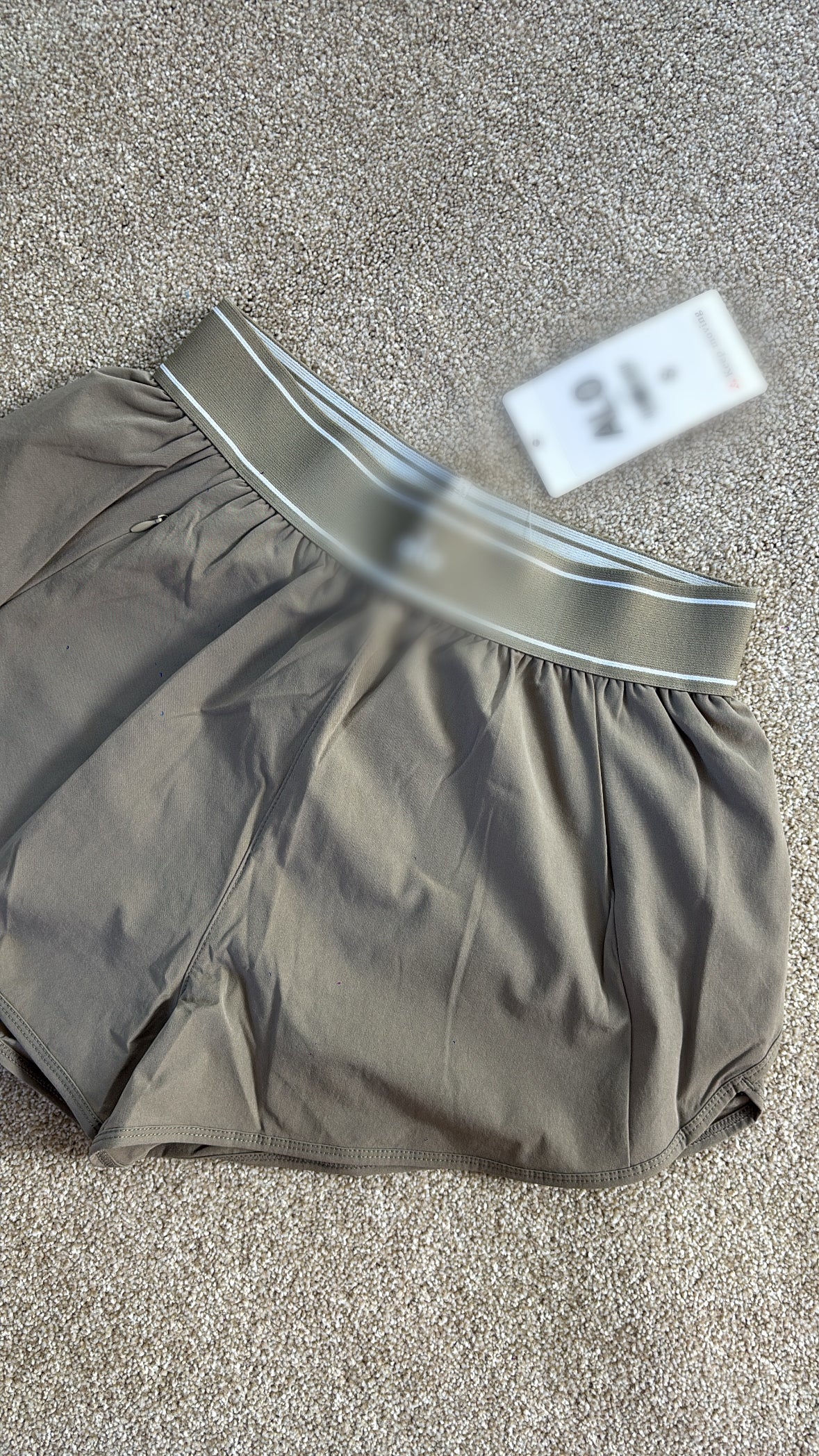 Beige and white dry fit A shorts size S