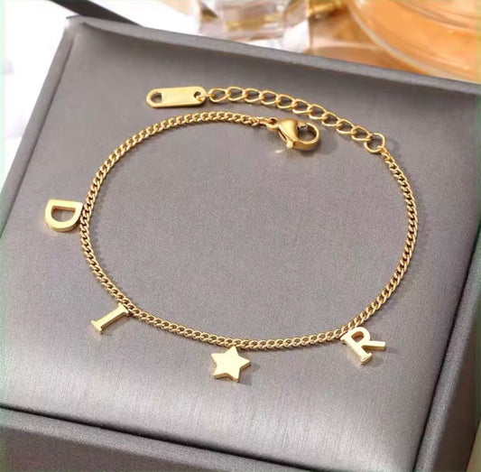 Gold Star D bracelet
