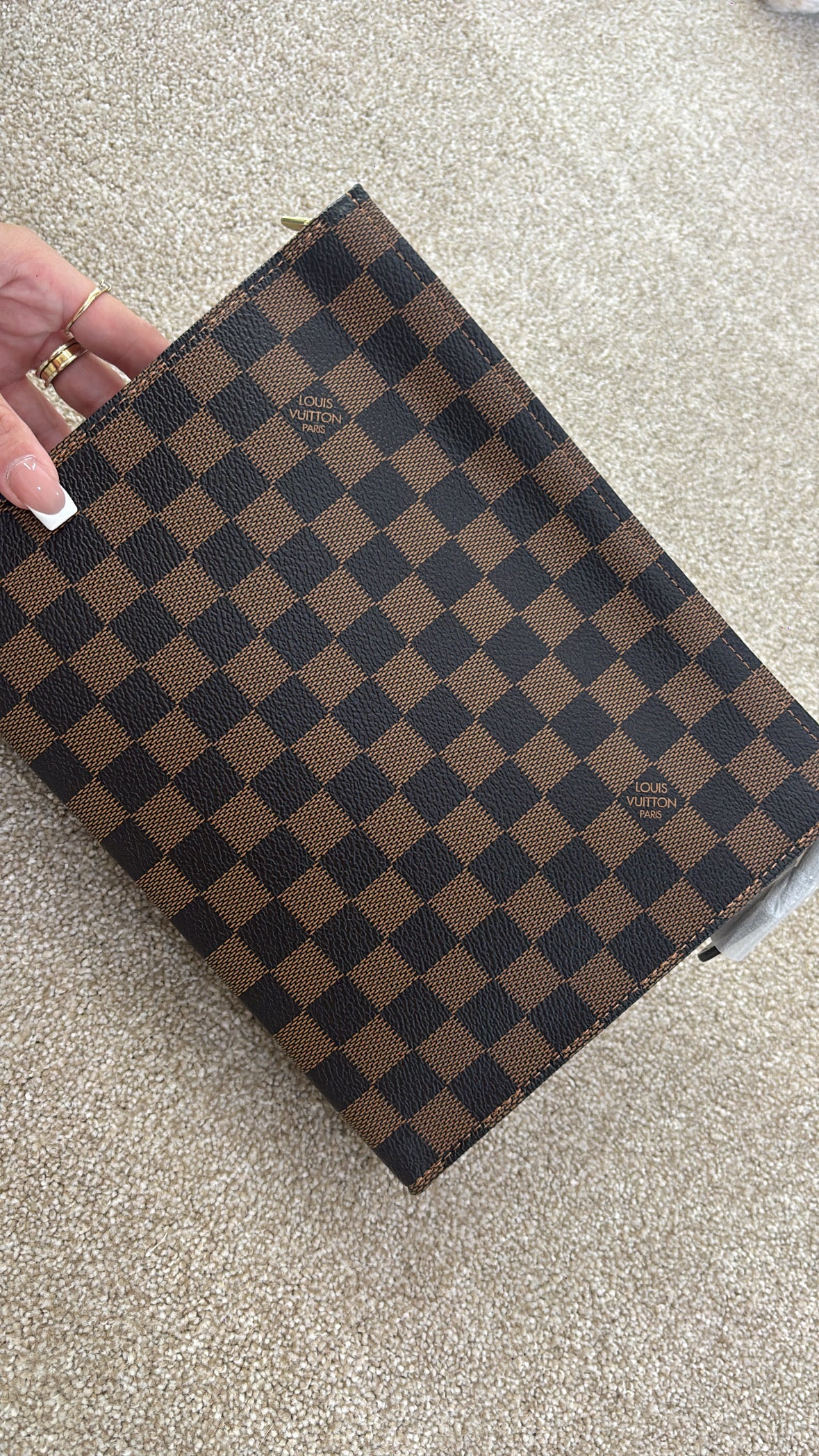 Brown grid clutch bag