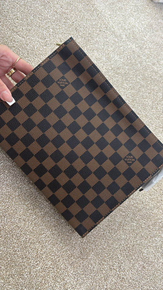 Brown grid clutch bag