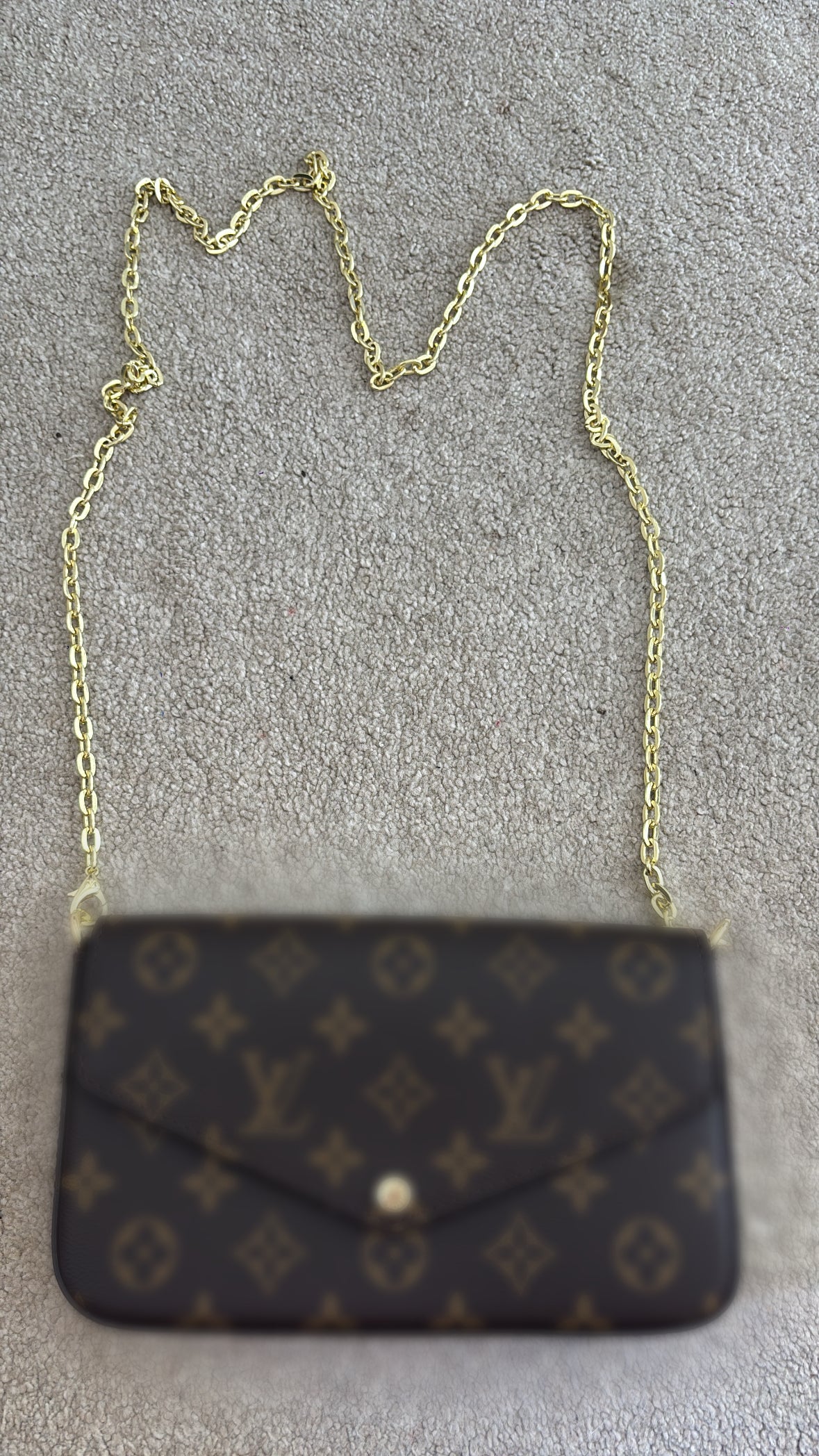 Brown and baby pink interior crossover bag