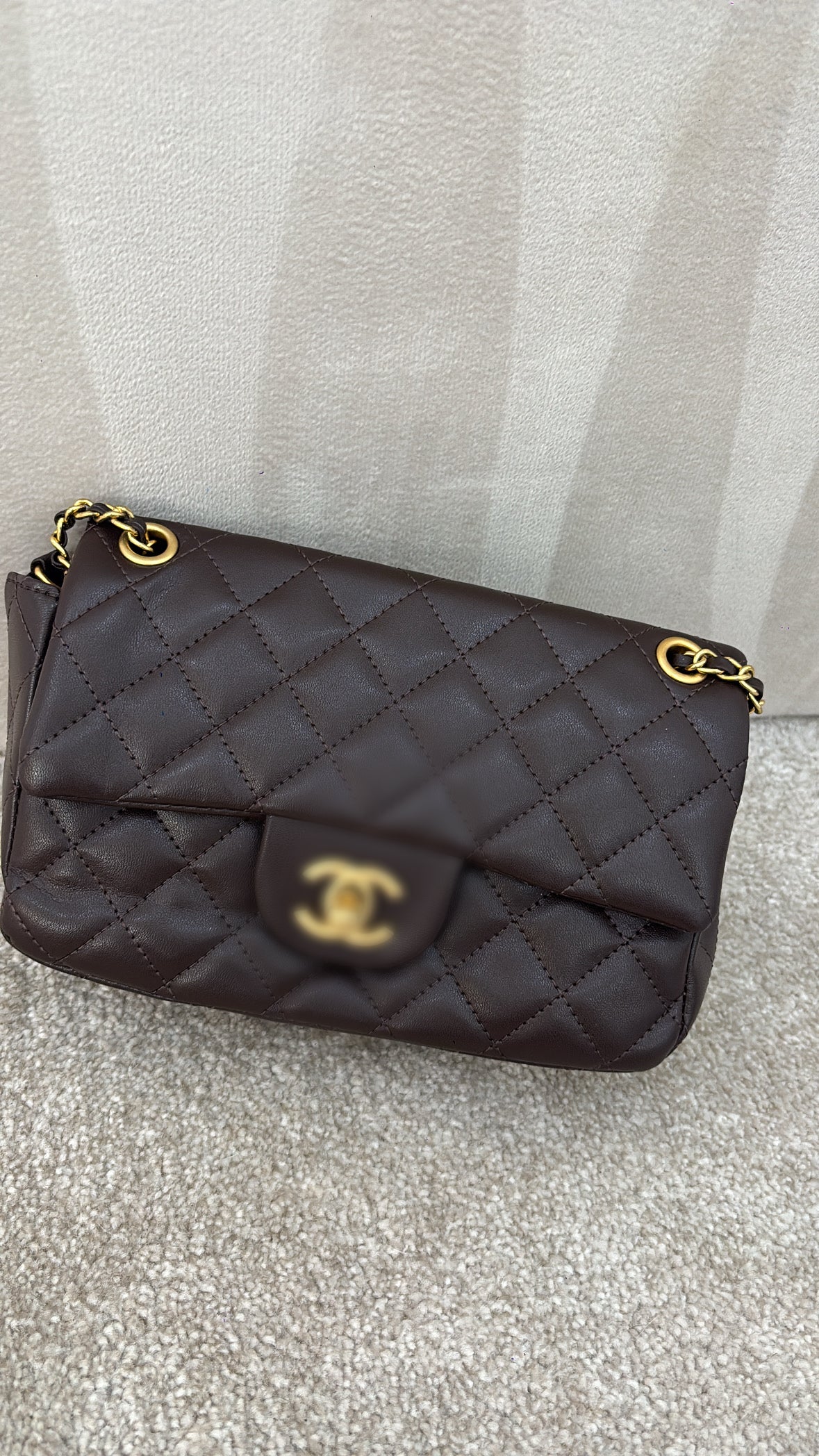 Brown mini C crossover bag