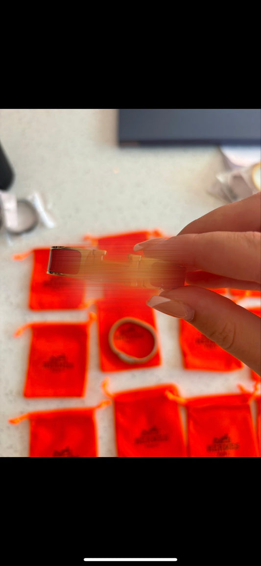 Red and gold H bracelet