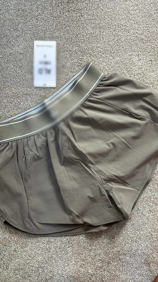 Beige and white dry fit A shorts size S