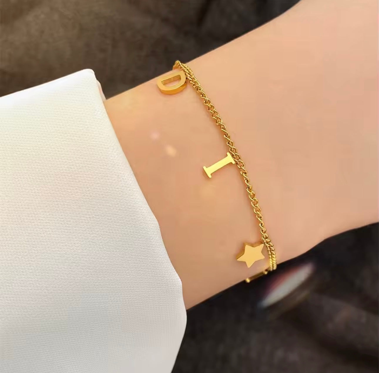 Gold Star D bracelet