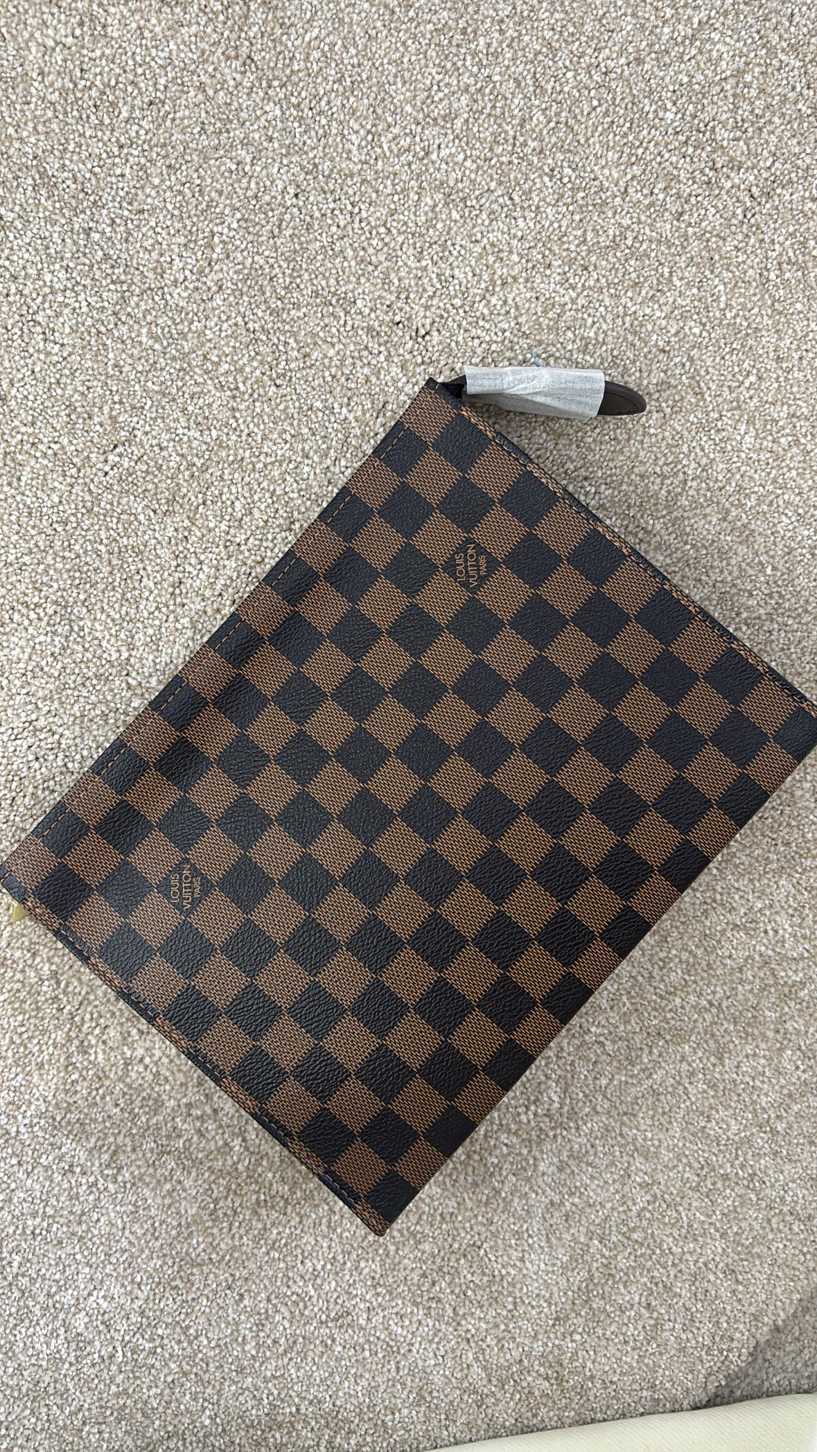 Brown grid clutch bag