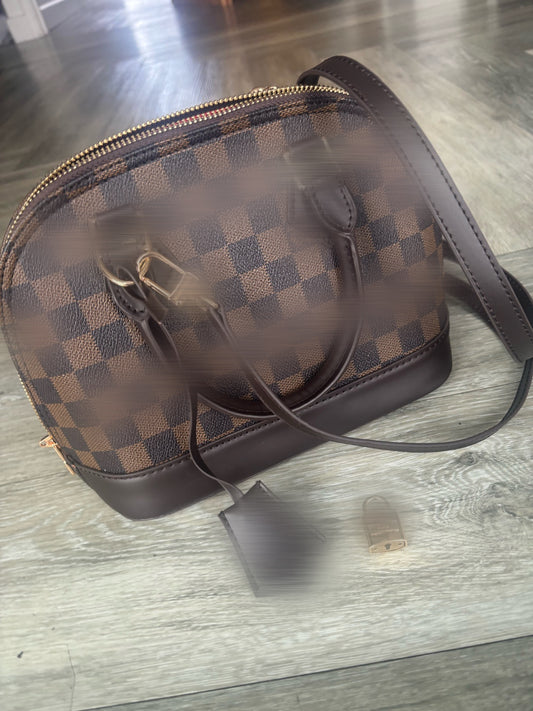 Brown grid handbag with long strap