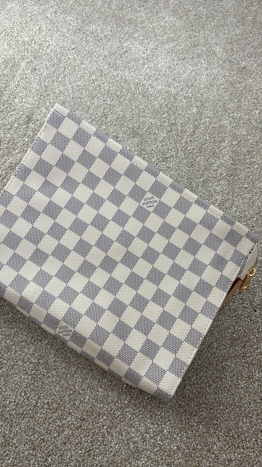 White grid clutch bag