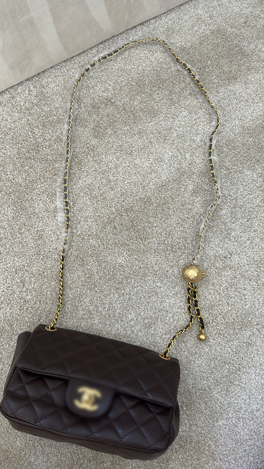 Brown mini C crossover bag